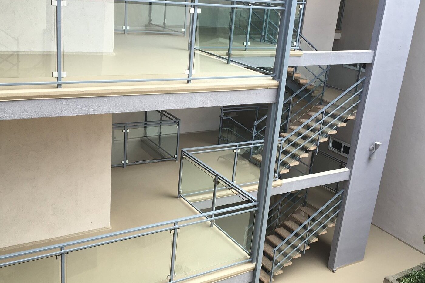 Multifamily balcony waterproofing project using Deck Flex ICC-ES listed system on an exterior elevated element