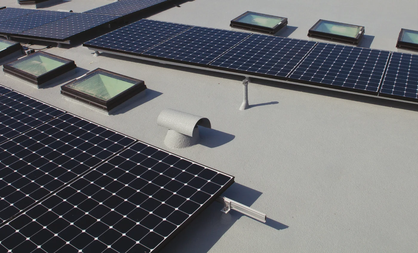 Deck Flex W.M. System installed on plywood roof deck with solar panels